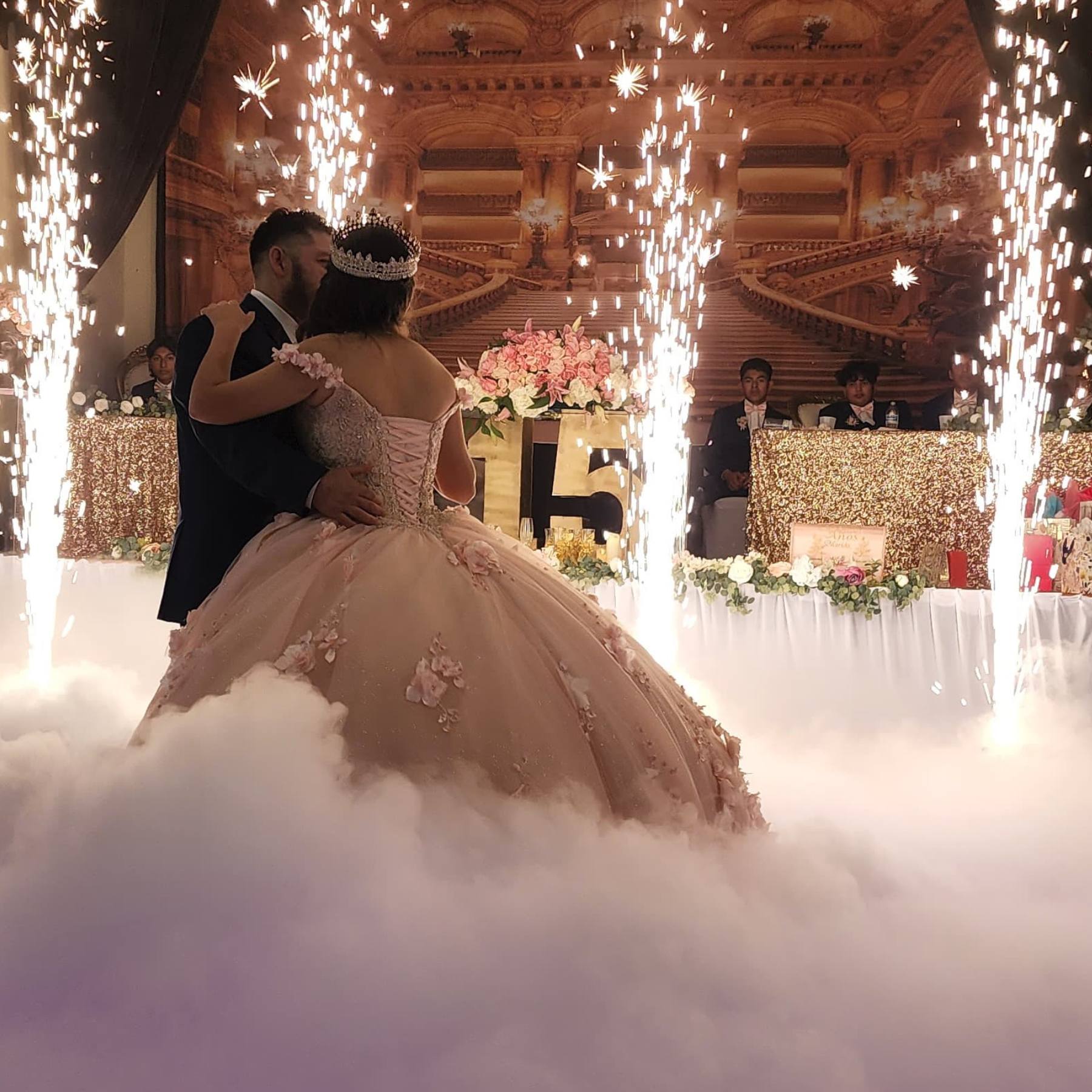 Quinceañera first dance with sparklers and low fog at DJ event
